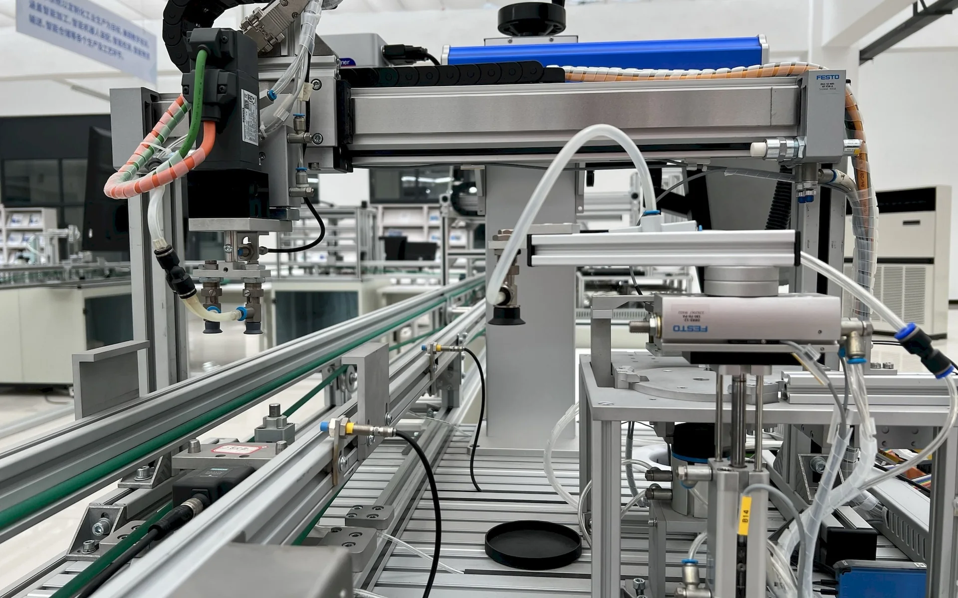 Modern industrial automation equipment with actuators, sensors and conveyor mechanisms